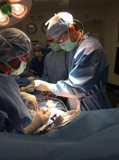 surgeon doing surgery